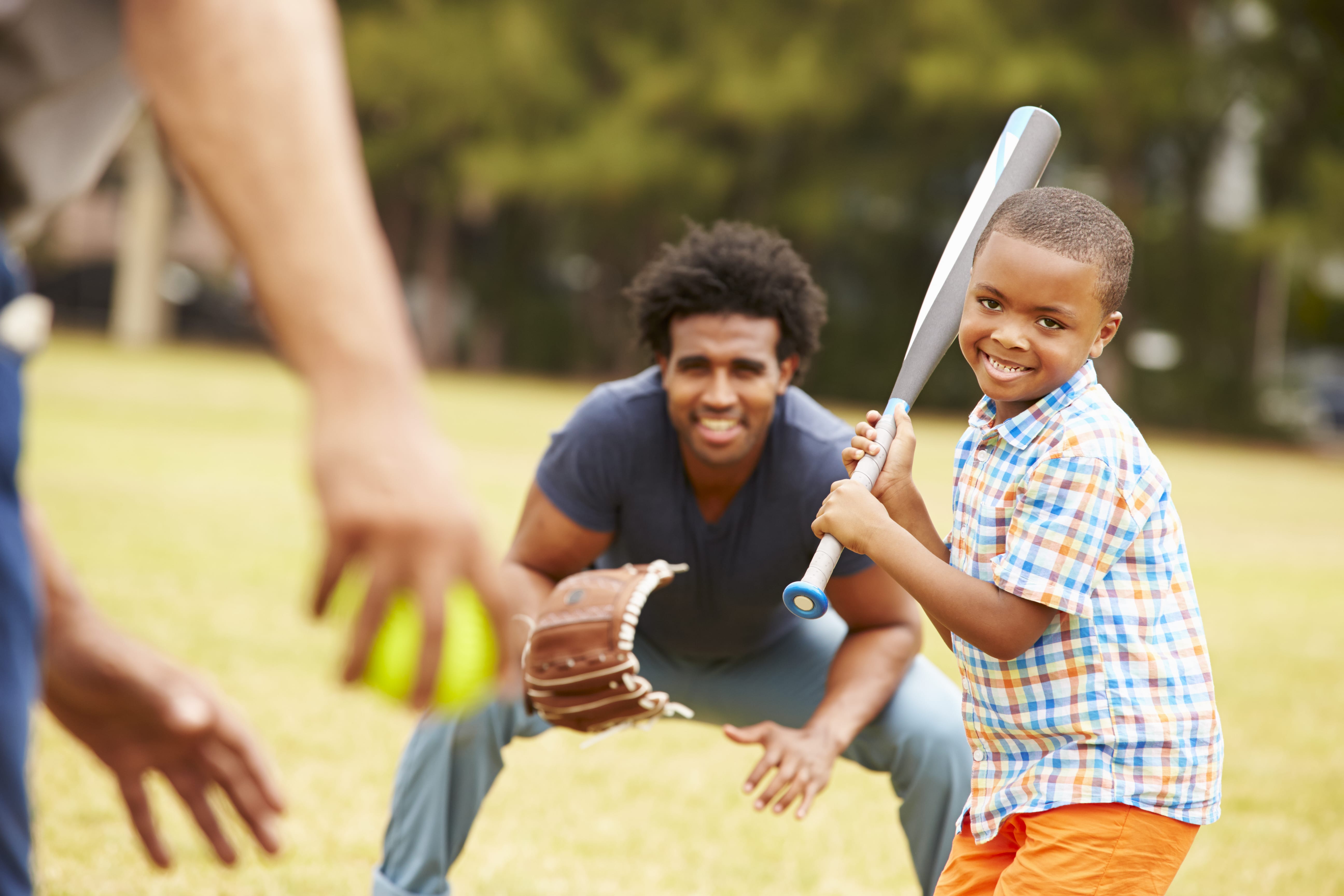 boy playing baseball